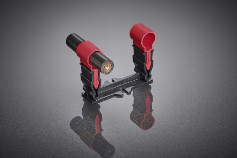 Die induktive Übertragungsspule wurde für hohe Schaltfrequenzen moderner SiC- und GaN-Inverter ausgelegt und ermöglicht trotz großer Luftspalte eine kompakte Bauform mit hoher Leistungsdichte und kontrollierter thermischer Belastung.